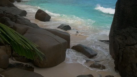 Ocean waves and granite rocks - Anse Intendance, Seychelles. Stock Footage 124490582