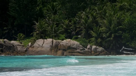 Ocean waves and granite rocks Police Bay Mahe Island Seychelles. Stock Footage 125022419