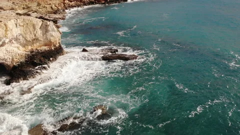 Ocean waves and rocks from drone Stock Footage 138796194