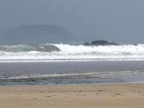 Ocean waves and rocks Stock Photos