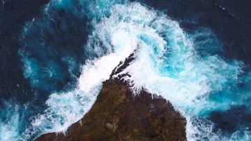 Ocean with waves and rocky cliff. Stock Footage 86164640