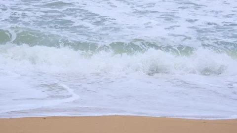 Ocean waves and sand on the beach of tropical seas in Thailand. Видео 207697617