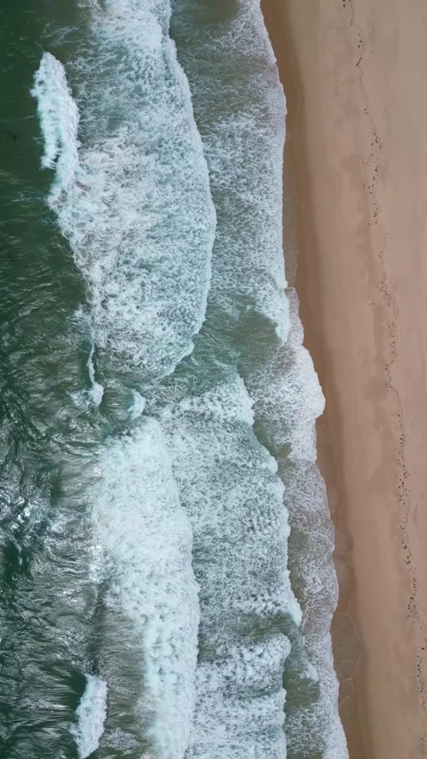Ocean waves and sandy beach Stock Footage 299148988