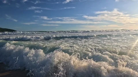 Ocean Waves and Sea Foam on Tropical Beach at Golden Hour Video stock 336207945