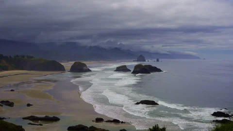 Ocean waves and sea stacks at Cannon Beach on the Oregon Coast Stock Footage 340664992