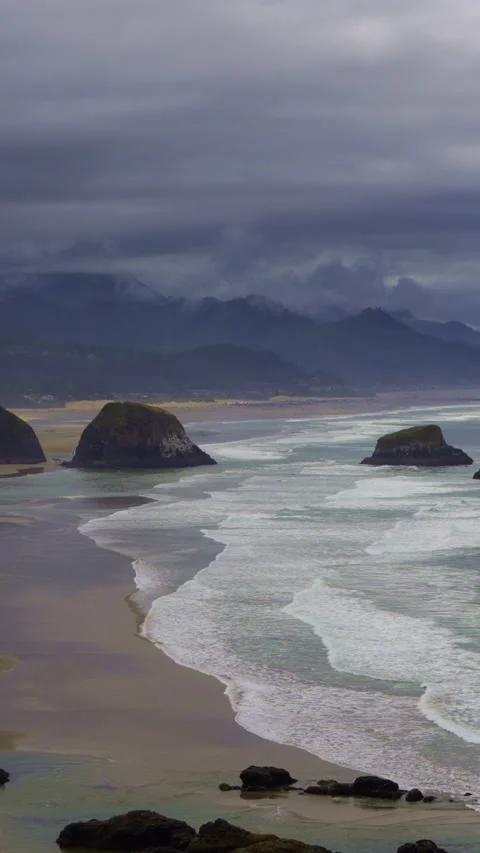Ocean waves and sea stacks at Cannon Beach on the Oregon Coast Stock Footage 342079117