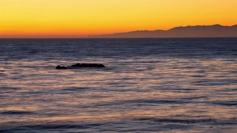 Ocean Waves and Sunset Afterglow Video stock 76693706