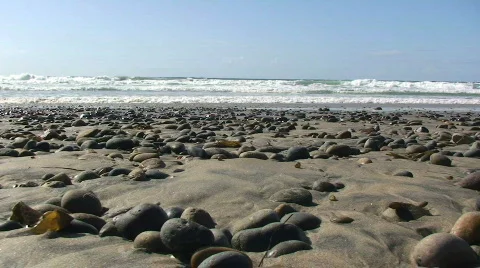 Ocean Waves Approaching Rock on Beach Stock Footage 346750