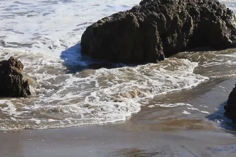 Ocean Waves around Rocks Close 2 Stock Footage 4734664