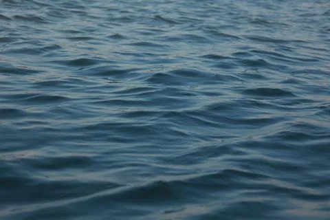 Ocean waves background, blue water background Фото