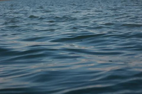 Ocean waves background, blue water background Фото