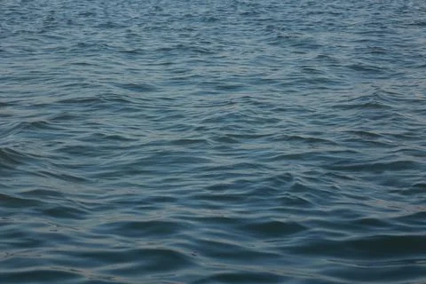 Ocean waves background, blue water background Фото