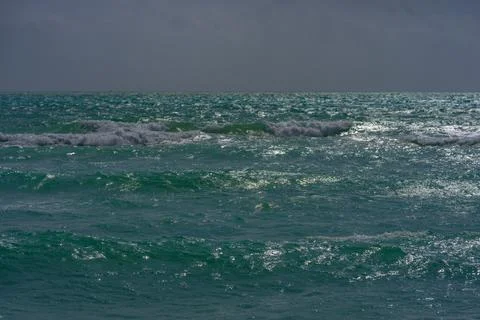 Ocean waves background. Tropical ocean waves. Blue seaside view. Foamy beach Stock Photos