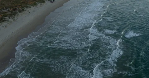 Ocean Waves on A Beach at Sunset Vídeos de archivo 121278184