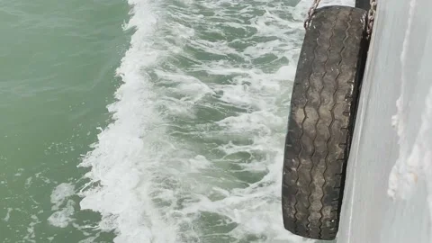 Ocean Waves Behind Moving Ferry Boat on Green Sea Water Vídeo Stock 196939807