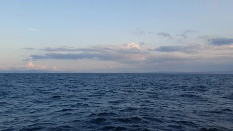 Ocean, waves, blue sky and clouds Stock Footage 336073432