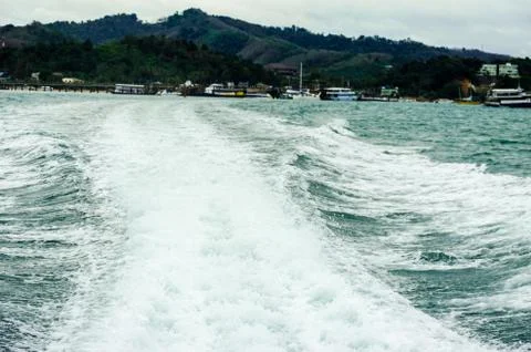 Ocean waves boat Stock Photos