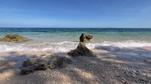 Ocean Waves Breaking Around Unique Coastal Rock Formation Stock Footage 334986192
