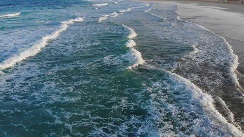 Ocean waves breaking at the beach aerial view from drone Stock Footage 105881177