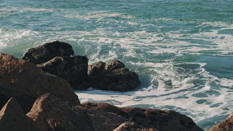 Ocean waves breaking over dangerous rocks in the Atlantic Ocean. Stock Footage 130628804