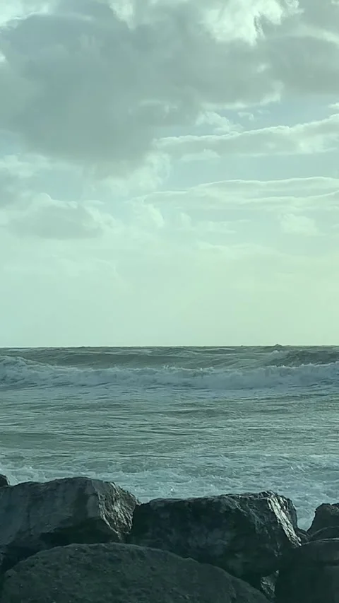 Ocean waves breaking over rocks Stock Footage 242428160