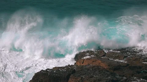 Ocean Waves Breaking on Rock Stock Footage 60571678