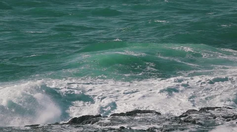 Ocean Waves Breaking on Rock Stock Footage 64290416