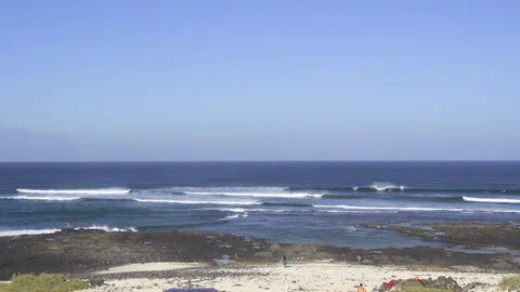 Ocean waves breaking on rocks and seashore Stock Footage 85813220