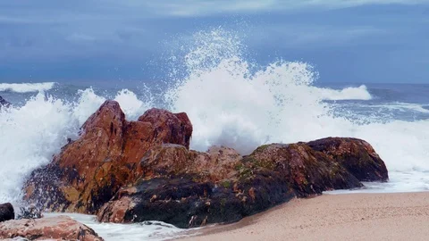 Ocean Waves breaking on rocks on beach, Atlantic Ocean Stock Footage 105170980