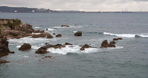 Ocean Waves Breaking on Rocky Coast from Cliff, Slow Motion Stock Footage 316626910