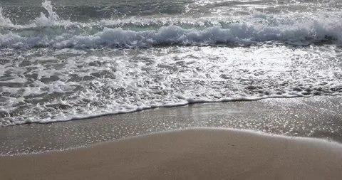 Ocean Waves breaking on Sandy Beach. Relaxing video of small sea waves Stock Footage 227156935