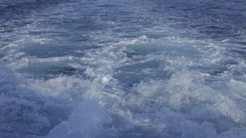 Ocean waves churned by boat. Slow motion. Stock Footage 322089384