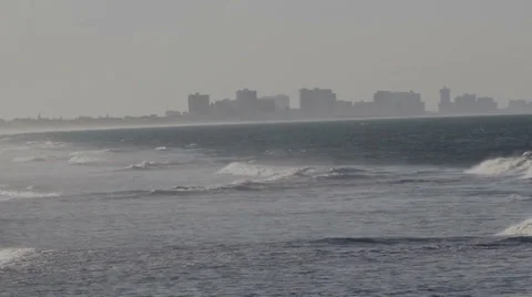 Ocean Waves &amp; City Skyline 動画素材 35338564