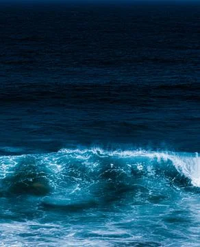 Ocean waves as coastal background, beach holiday destination and luxury travel Stock Photos