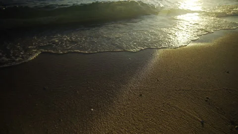 Ocean waves coming onto the beach Stockbeeldmateriaal 212945745