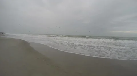 Ocean waves coming into shore pan shot Stock Footage 62701574