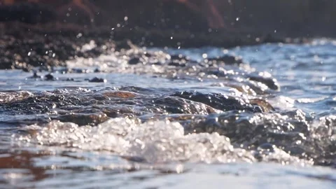 Ocean waves crash against rocks Stock-Footage 257082658