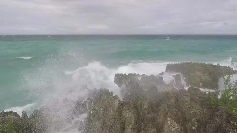 Ocean Waves crash on Rocks, Bantigue beach, Malapascua island, Philippines Stock Footage 246823811