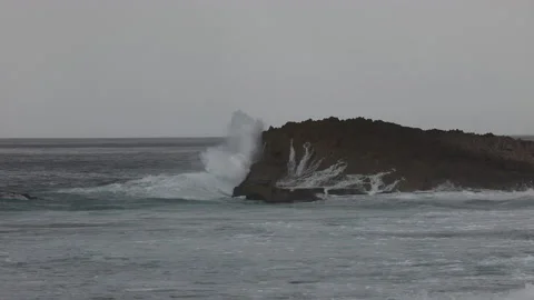 Ocean waves crash on the rocks on the coast of Puerto Rico. Stock Footage 147979282