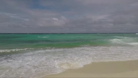 Ocean Waves crash on sandy Bantigue beach, Malapascua island, Philippines Stock Footage 246599372