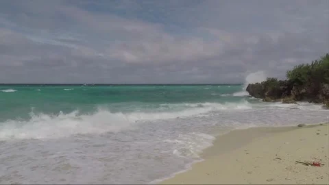 Ocean Waves crash on sandy Bantigue beach, Malapascua island, Philippines Stock Footage 246633790