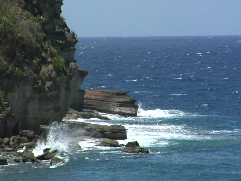 Ocean waves crash unique rocks Stock Footage 708861