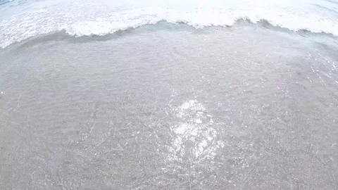 Ocean waves crashing against an empty beach Video stock 103042621