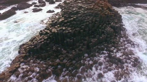 Ocean waves crashing on basalt columns in Iceland Stock Footage 330281301