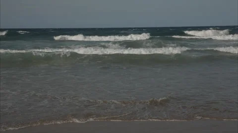 Ocean waves crashing on the beach Stock Footage 53234862
