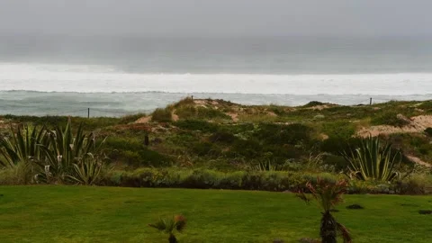 Ocean waves crashing on a cloudy gray day with copy space Stock Footage 307852354