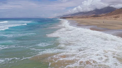 Ocean waves crashing on Cofete Beach, Fuerteventura Stock Footage 313400618