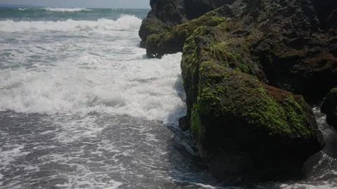 Ocean waves crashing on mossy rocks Stock Footage 341515433