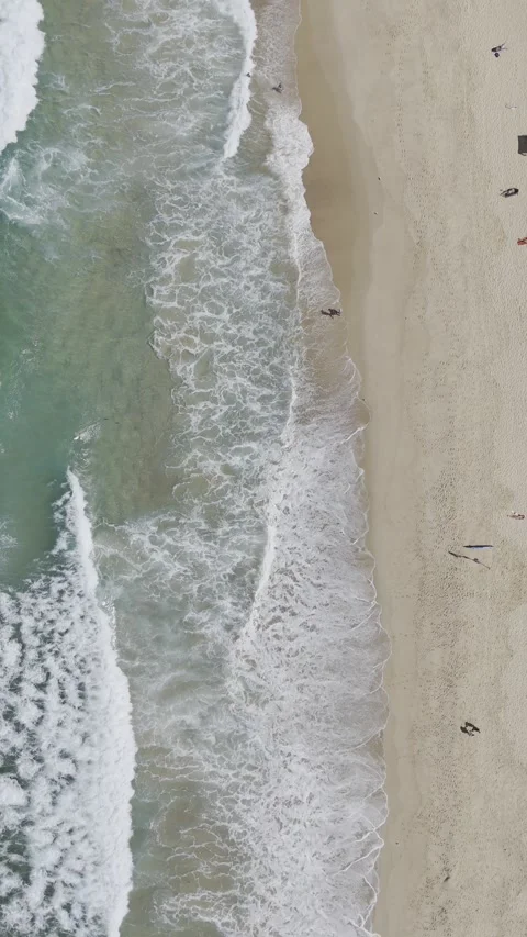 Ocean Waves Crashing over Beach Drone Footage 4K HD Stock Footage 334931512