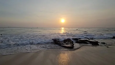 Ocean Waves Crashing Over Rocks at Dreamland Beach, Bali at Sunset Stock Footage 340390966